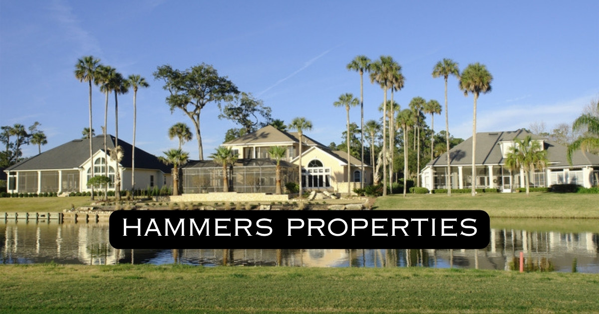 Golf course homes on a lake in Boca Raton with Hammers Properties logo