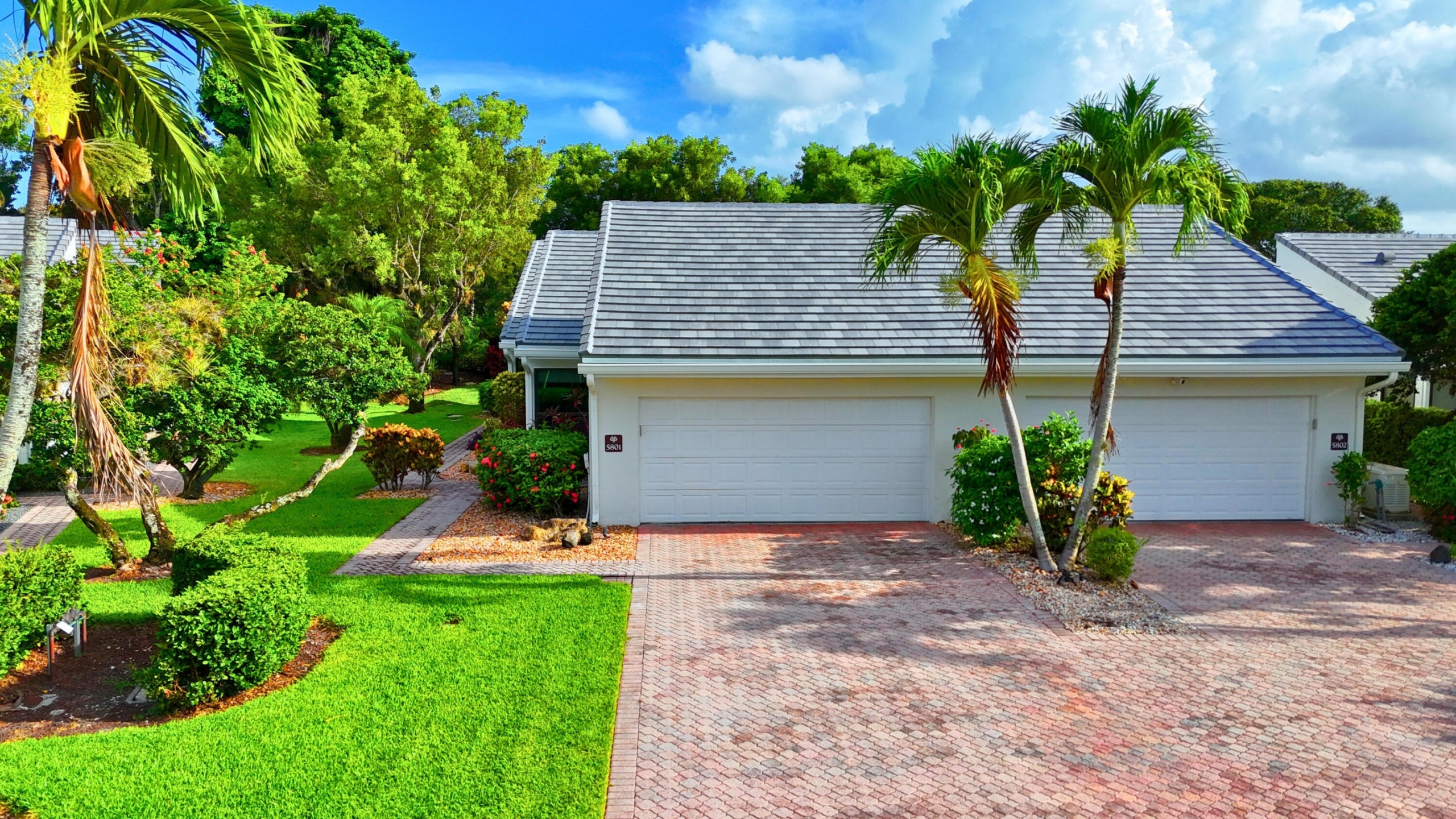 Single-level home with two-car garage at 19890 Sawgrass Lane #5801, Peppertree, Boca West Country Club